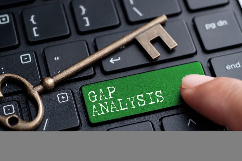 A keyboard with a green key that reads ‘gap analysis’.