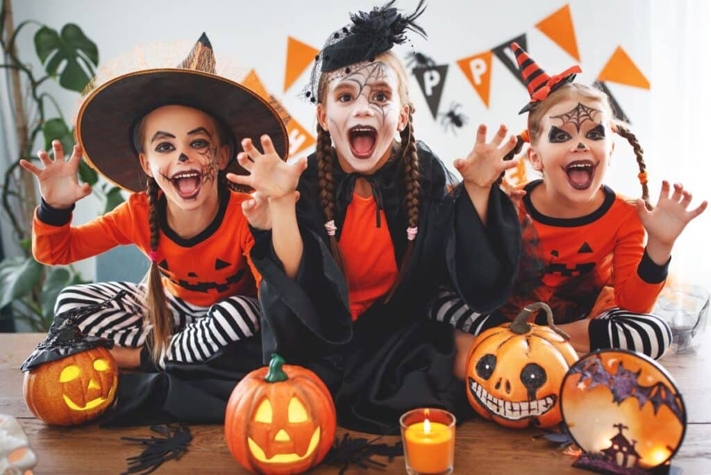 A group of students in Halloween costumes.