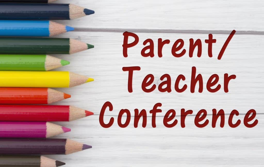 Colored pencils with the words Parent Teacher Conference.